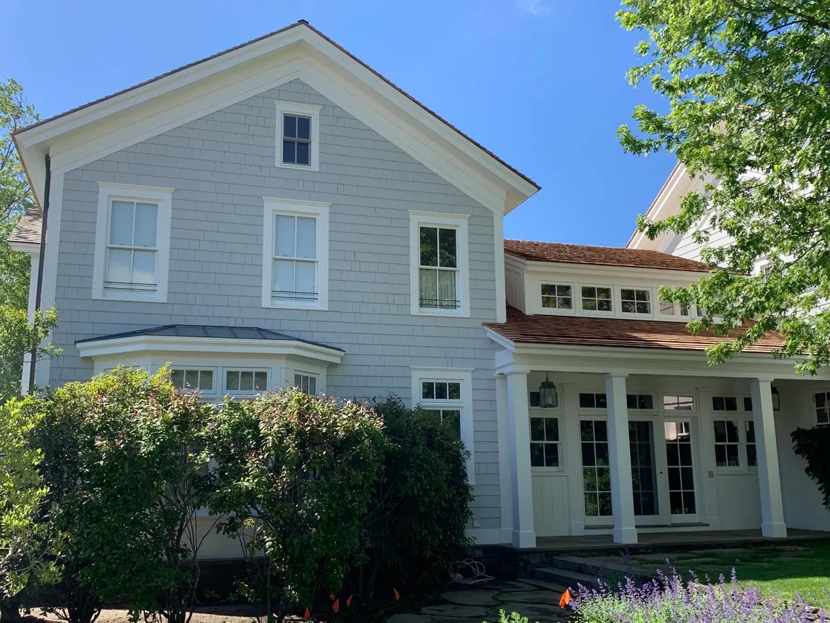 Finished exterior repaint on an East End home