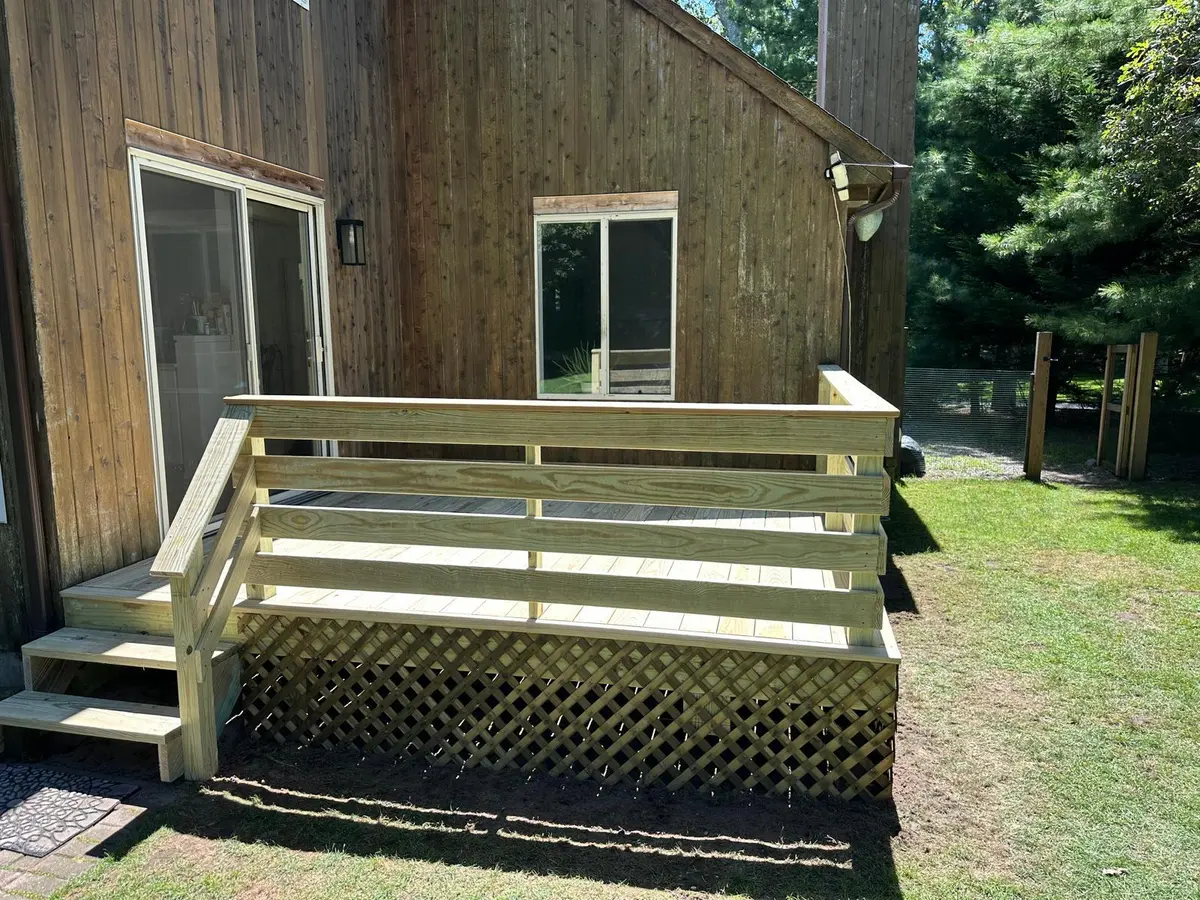 New deck with stairs and lattice skirting